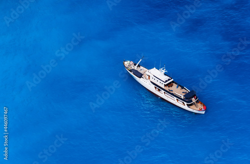 Aerial view at the cruise ship at the day time. Adventure and travel.  Landscape with cruise liner in Greece. Luxury cruise. Travel and vacation image. Aerial seascape. © biletskiyevgeniy.com