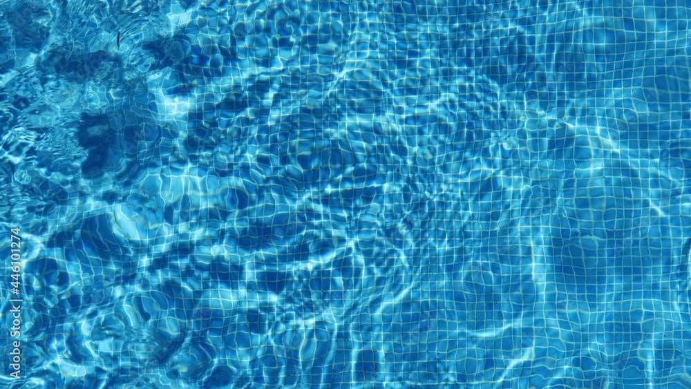 Swimming Pool water from above, close-up top down shot. Swimming Pool water from above, close-up top down shot.