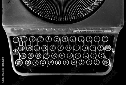 old typewriter on a white background photo
