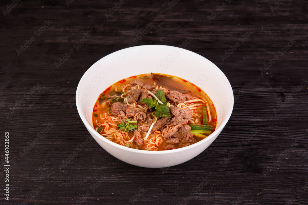 soup with beef pieces, bean sprouts and greens soup with beef pieces, bean sprouts and greens