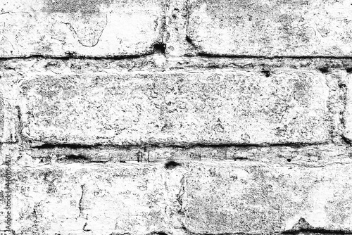 Texture of a brick wall with cracks and scratches which can be used as a background