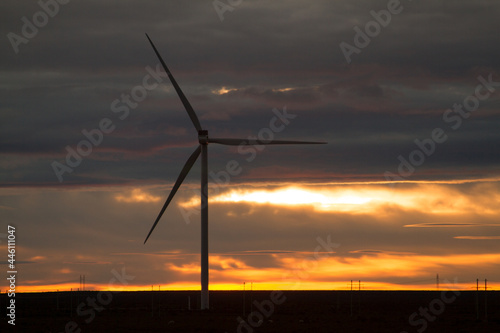 windmill in the reddish sunset, backlighting