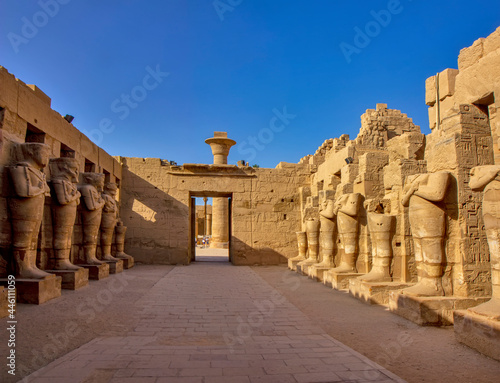 The pillars of Osiris in the courtyard of the Temple of Ramses III, Karnak, Egypt