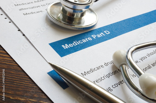 Stethoscope with medicare part D drug coverage info and pen.