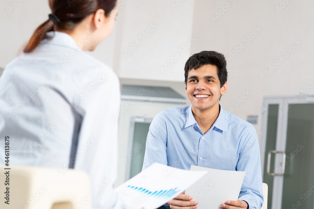portrait of a young man at a business meeting portrait of a young man at a business meeting