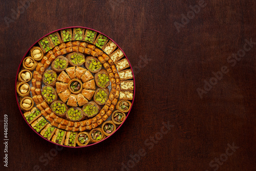 Traditional turkish, arabic sweets baklava assortment with pistachio. Top view, copy space
