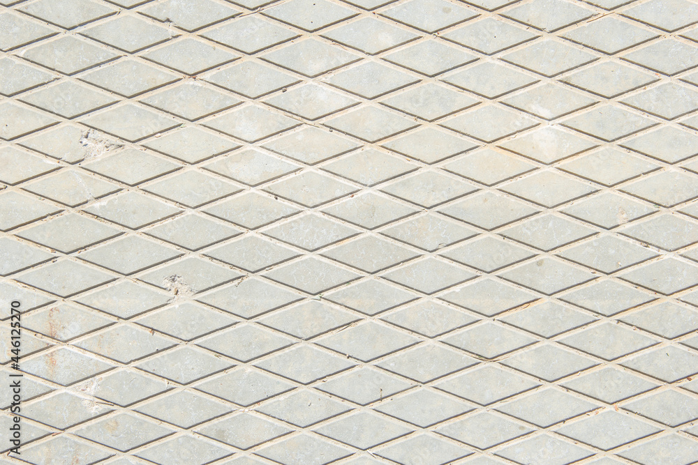 Obraz premium Concrete slab. Drawing of diamonds. The texture of the concrete slab. Gray background.