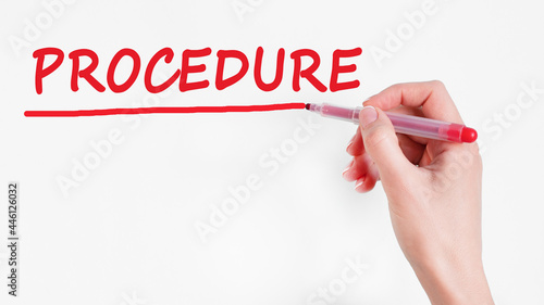 hand writing inscription procedure with marker, stock image photo