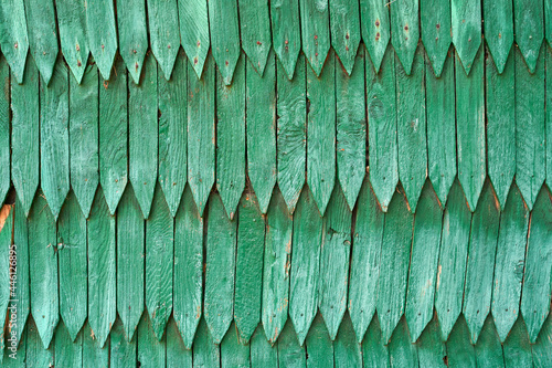 Old vintage green wood shingle wall background