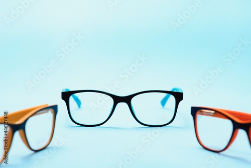 Child's plastic frame for glasses. Mock up for the design of optics store and shop, eye clinic. Glasses for reading and distance, correction of sight. Beautiful eyeglasses rim.