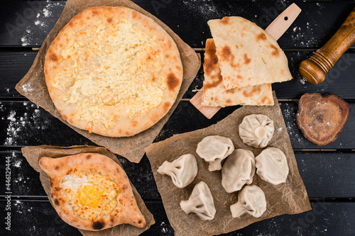 Georgian cuisine foodset from khachapuri and khinkali photo