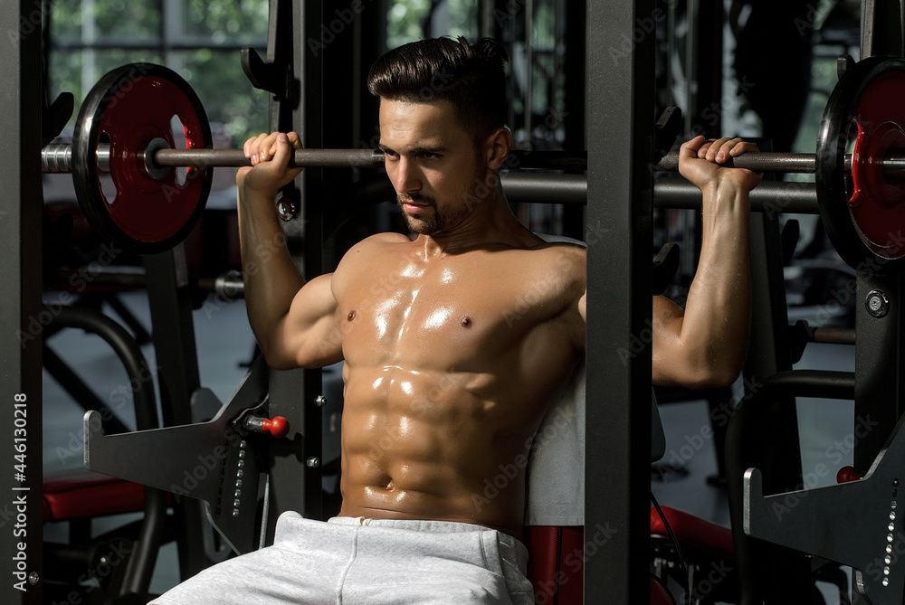 muscular man with barbell muscular man with barbell