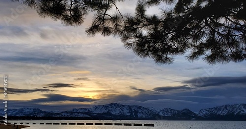 sun over the lake   mountains