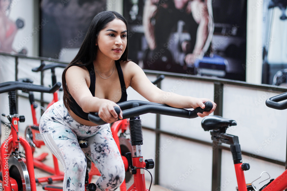 Fototapeta premium young woman training in a gym