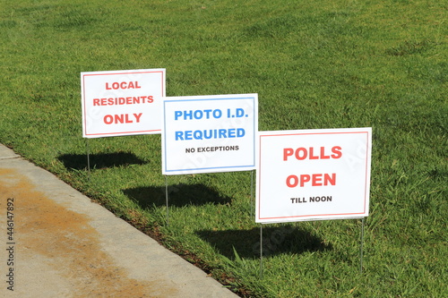 Signs along the walkway leading to the polling place