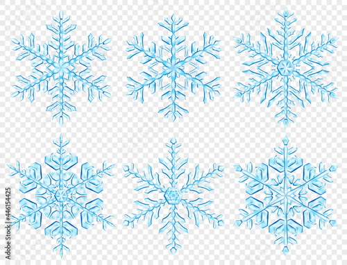 Set of big complex translucent Christmas snowflakes in light blue colors, isolated on transparent background. Transparency only in vector format