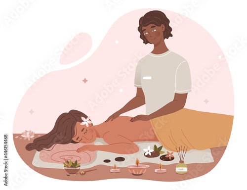 Spa Therapy concept. Woman performs a therapeutic massage procedure. Patient lies on the couch and relaxes. Candles, flowers and aromatic oils. Cartoon flat vector illustration on a white background