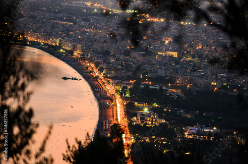 Aerial night view of Kalamata city, Greece. Kalamata is one of the most beautiful cities in Greece and a popular tourist destination photo