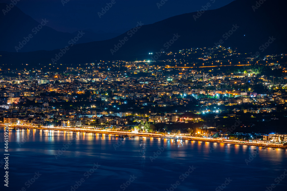 Aerial night view of Kalamata city, Greece. Kalamata is one of the most beautiful cities in Greece and a popular tourist destination