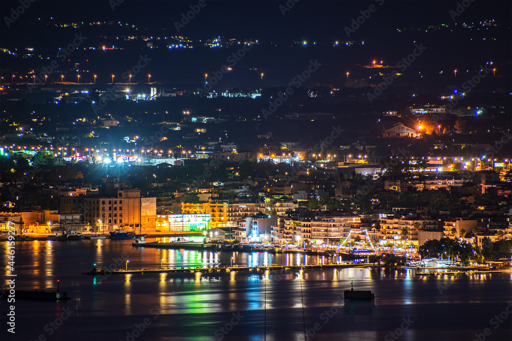 Aerial night view of Kalamata city, Greece. Kalamata is one of the most beautiful cities in Greece and a popular tourist destination