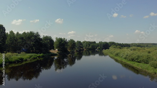 Fototapeta Naklejka Na Ścianę i Meble -  Drone point view of group people kayaker floating on water. Aerial drone view of group kayak in lake. Kayaking and Canoeing along the Riverbed Aerial View. Rafting. Tracking a Boat
