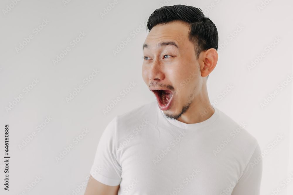 Funny shocked and surprised face of Asian man isolated on white background. Funny shocked and surprised face of Asian man isolated on white background.