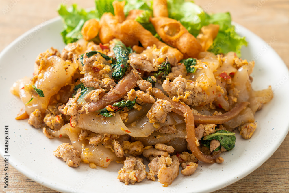 Stir-fried noodle with minced chicken and basil Stir-fried noodle with minced chicken and basil