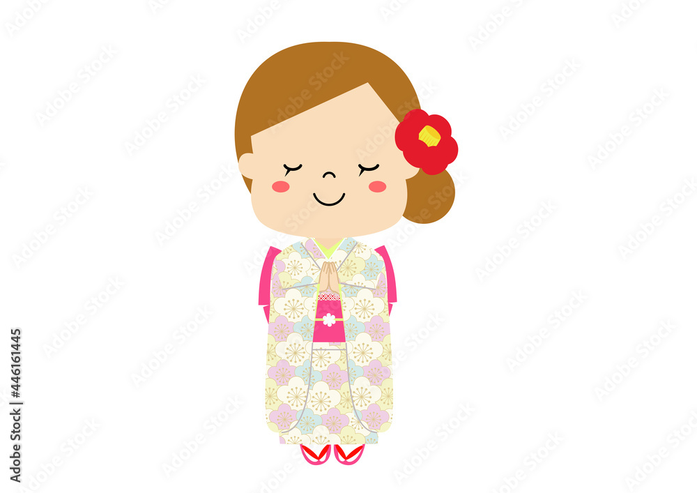 手を合わせて願い事、お詣りをする着物姿の女の子