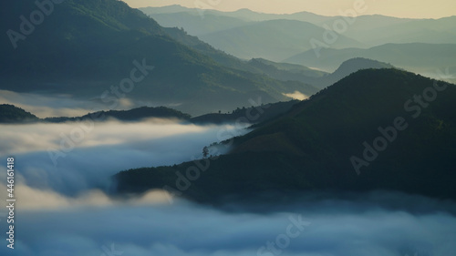 morning fog mist and clouds, Nong Khiaw Muang Ngoi Laos, dramatic landscape scenic pinnacle cliff, famous travel destination in South East Asia