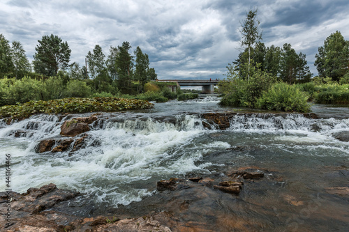 Summer landscape with a waterfall. Western Siberia
