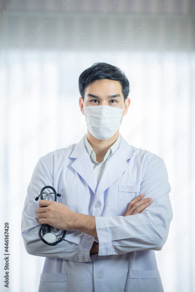 closeup doctor portrait holding stethoscope, medical equipment kit ...