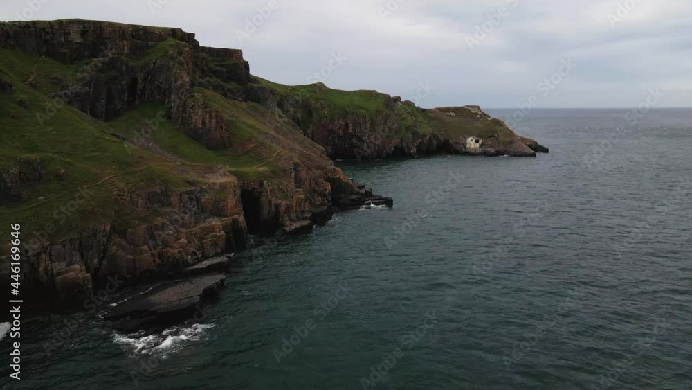 Aerial View Of Rocky Coastline Of Peninsula Near Rhossili In Wales, UK. Aerial View Of Rocky Coastline Of Peninsula Near Rhossili In Wales, UK.