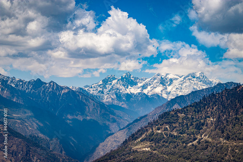 himalaya mountain valley with bright blue sky at day from hilltop © explorewithinfo