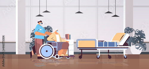 helper taking care of senior disabled patient nurse pushing wheelchair care service concept