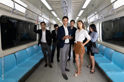 portrait group of business people in subway train © offsuperphoto