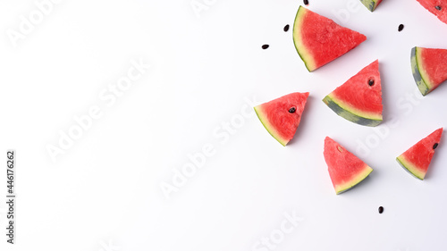 Slices of fresh watermelon on white background with copy space.