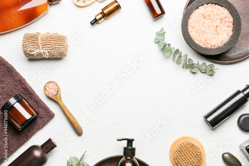 Frame made of bath supplies on light background