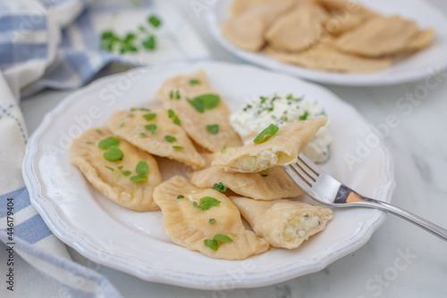 Pierogi ruskie, Baked dumplings stuffed with curd cheese and potatoes