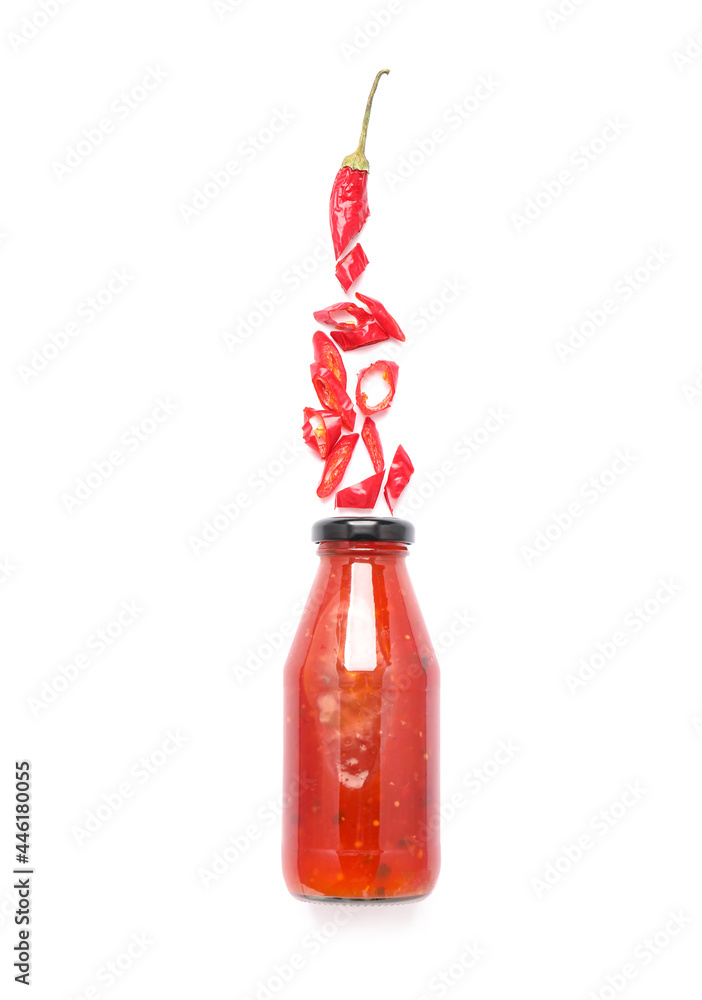 Obraz premium Bottle of chili sauce on white background