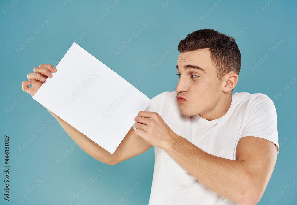 emotional man with white sheet of paper fun blue background emotional man with white sheet of paper fun blue background
