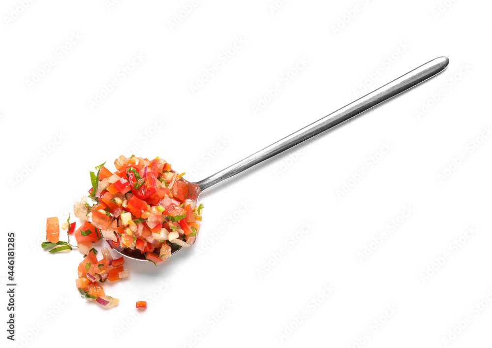 Spoon with tasty salsa sauce on white background Spoon with tasty salsa sauce on white background