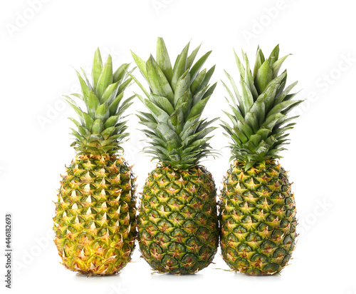 Fresh pineapples on white background