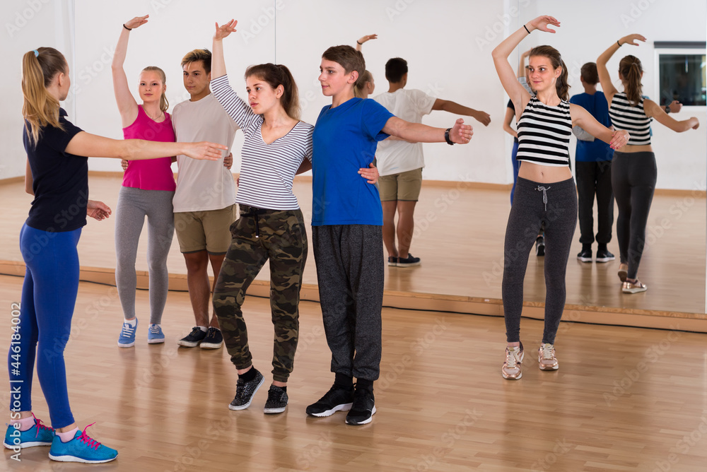 © JackF - happy teens studying folk style dance in class © JackF - happy teens studying folk style dance in class