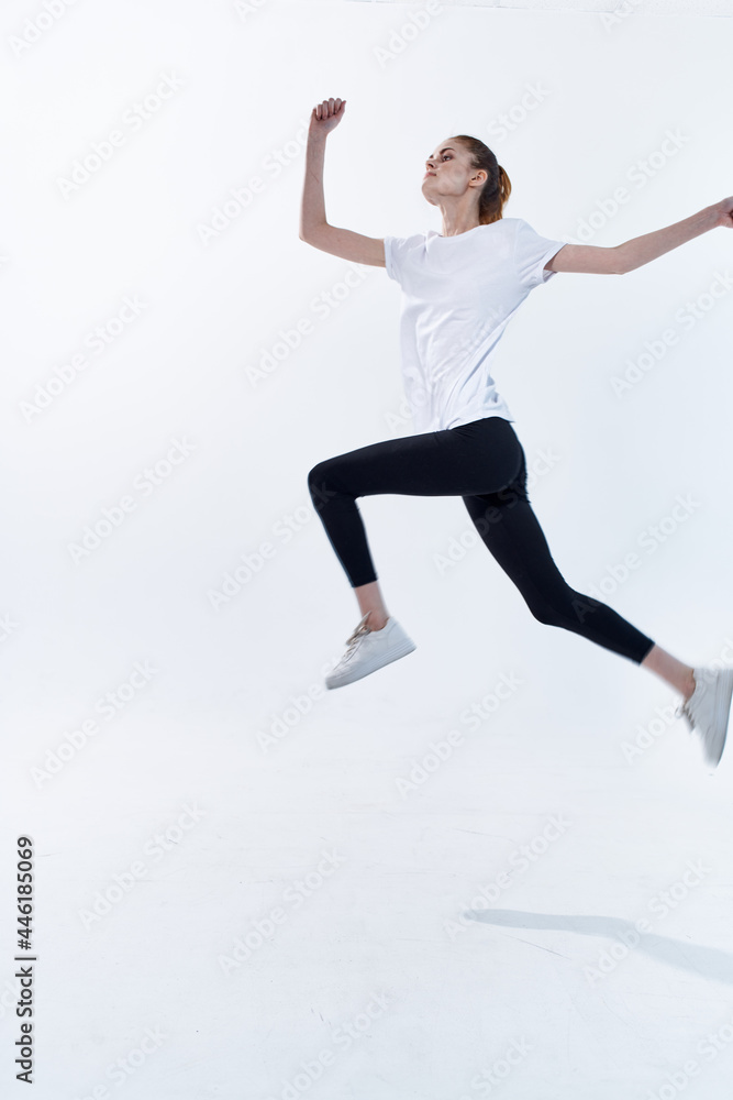 cheerful athletic woman jumping energy workout cardio