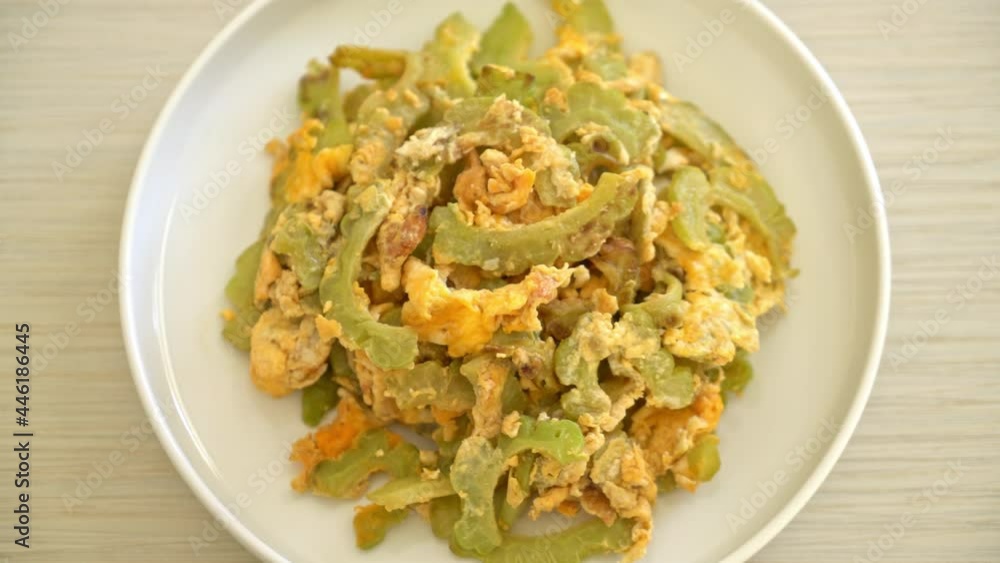 Stir Fried Bitter Gourd with Egg on plate Stir Fried Bitter Gourd with Egg on plate