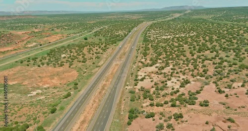 A highway in New Mexico along the desert landscape of American country road