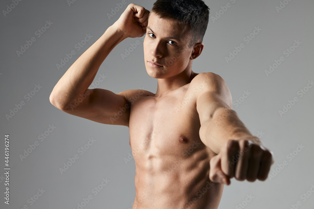 sexy athlete with pumped up torso portrait cropped view fitness