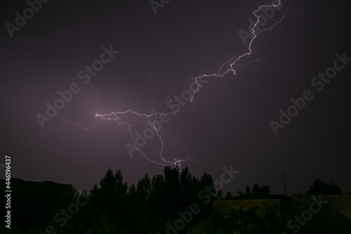 Lightning during a storm over the city in the nightLightning during a storm over the city in the night