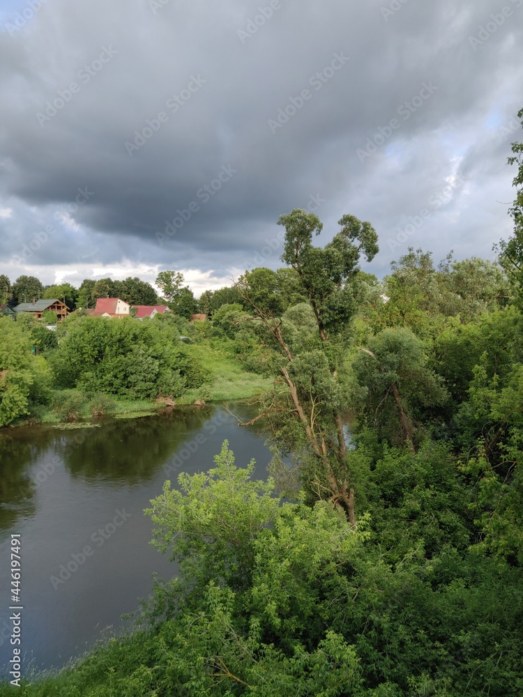 Fototapeta premium river, green and clouds
