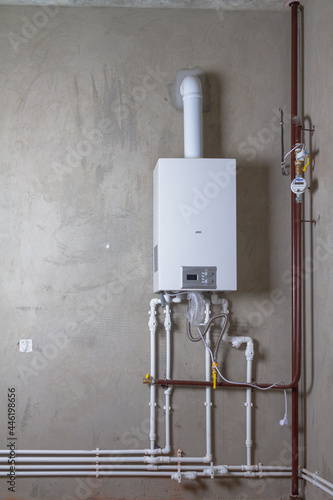 Double-circuit gas boiler in a new house for winter heating and water heating